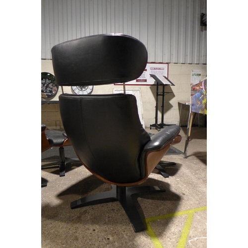 3043 - Kuka Karma Black Leather Swivel Reclining armchair with footstool, Original RRP £579.99 + vat    (30... 