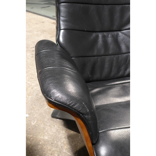 3044 - Kuka Karma Black Leather Swivel Reclining armchair with footstool, Original RRP £579.99 + vat  (309-... 