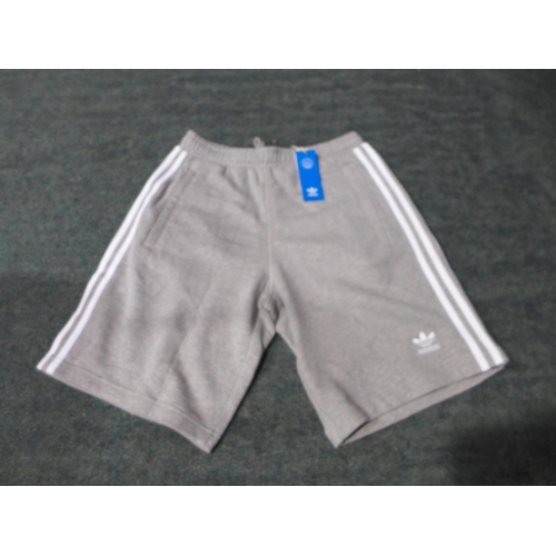 3277 - Four pairs of men's grey Adidas shorts - mixed size * this lot is subject to VAT