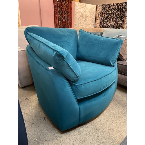 1474 - A Barker and Stonehouse teal velvet upholstered swivel chair