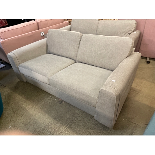 1475 - A grey upholstered three seater sofa RRP £999