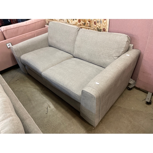 1476 - A grey upholstered three seater sofa RRP £999