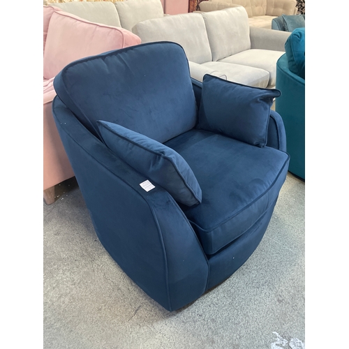 1472 - A deep blue velvet upholstered swivel chair