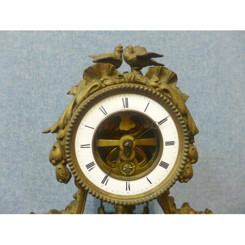 368A - A 19th Century French gilt spelter mantel clock  with girl on a swing