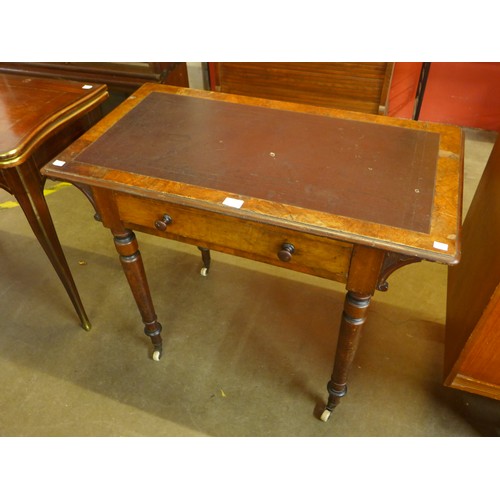 129A - A Victorian mahogany single drawer writing table