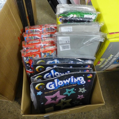 2441 - A quantity of children's items including glowing stars, fire house building block sets and miniature... 