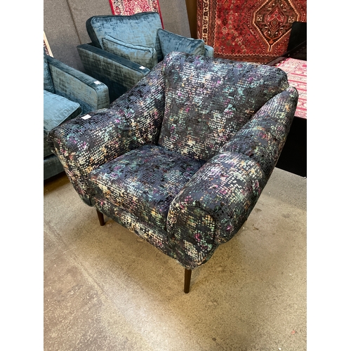 1311 - A blue and multi-coloured upholstered armchair
