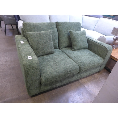 1317 - A Shada Hopsack green upholstered two seater sofa RRP £849