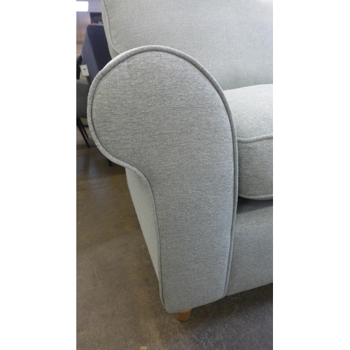 1355 - A Rosa pistachio upholstered corner sofa RRP £1598