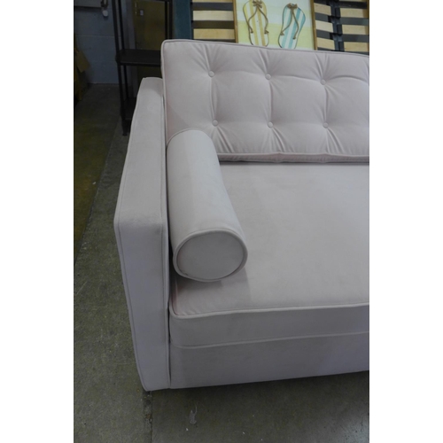 1340 - A pink velvet metal action oversized sofa bed