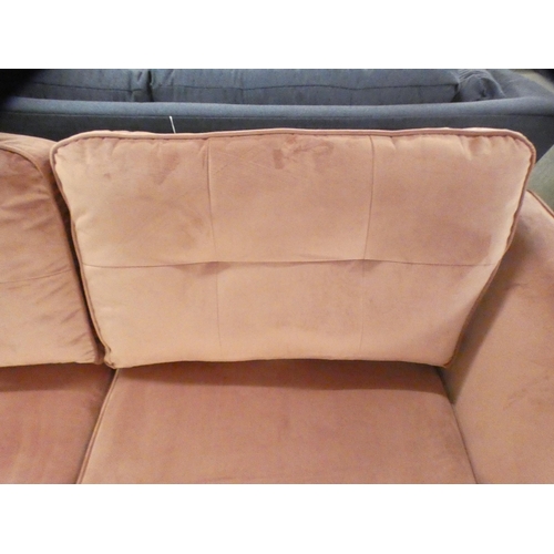 1377 - An cherry blossom velvet upholstered three seater sofa on stiletto legs