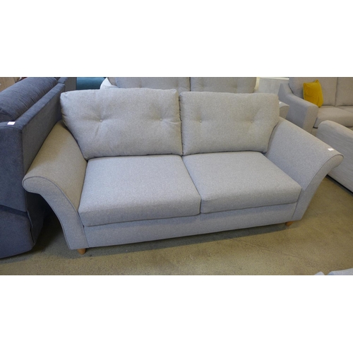 1378 - A grey upholstered three seater sofa