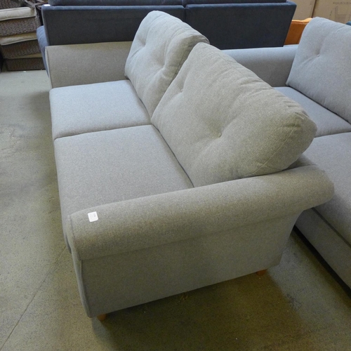 1378 - A grey upholstered three seater sofa