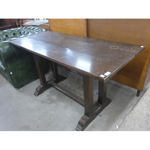 152 - An Arts and Crafts oak refectory table