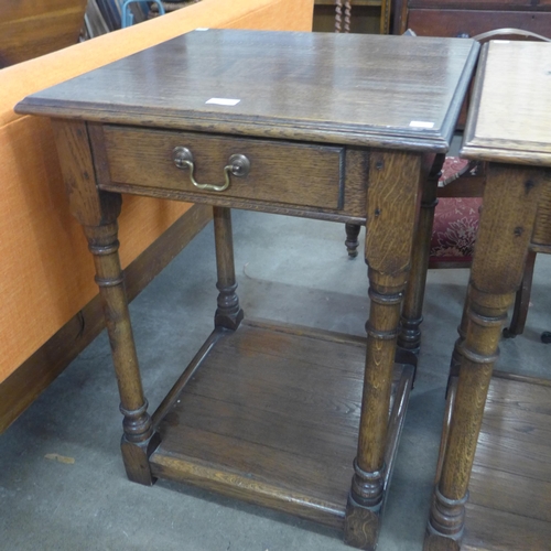 175 - A George III style oak single drawer lamp table