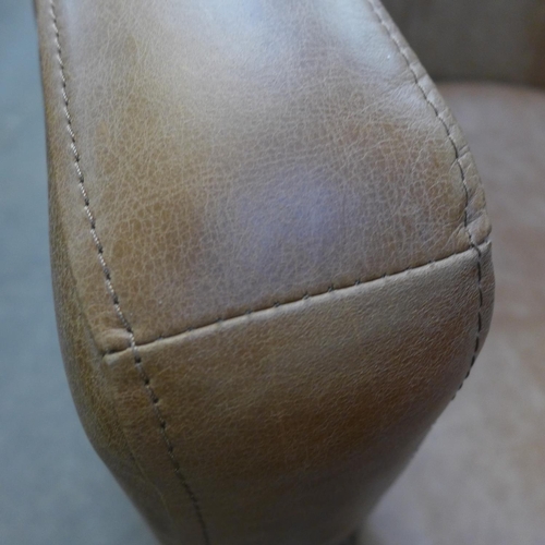 1303 - A vintage tan vintage leather club chair, RRP £860 * this lot is subject to VAT