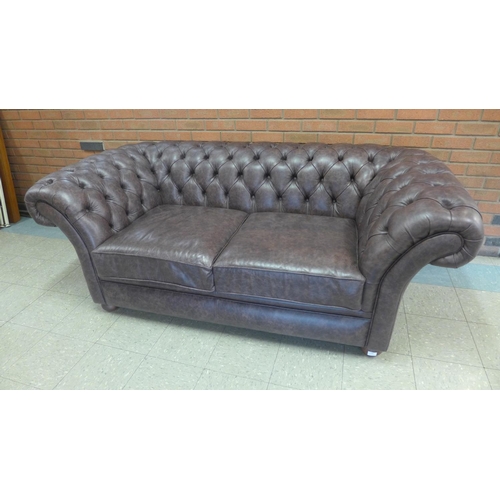 1306 - A Scholar chocolate distressed leather upholstered Chesterfield three seater sofa , RRP £2400 * this... 