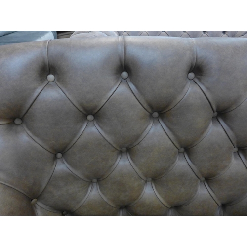 1319 - A vintage style brown leather tufted glove two seater sofa * this lot is subject to VAT