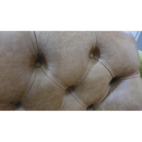 1328 - A vintage tan leather upholstered tufted glove armchair * this lot is subject to VAT