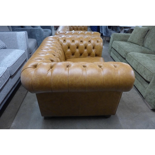 1386 - A Judge, Hobnail saddle leather upholstered Chesterfield style love seat, RRP £1745 * this lot is su... 