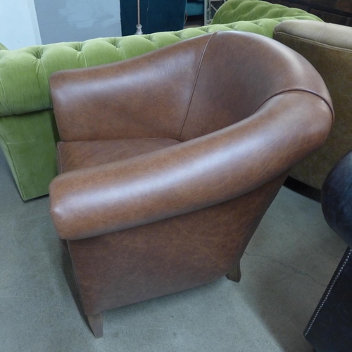 1396 - A Hoots mocca leather club chair with studwork , RRP £1390 * this lot is subject to VAT