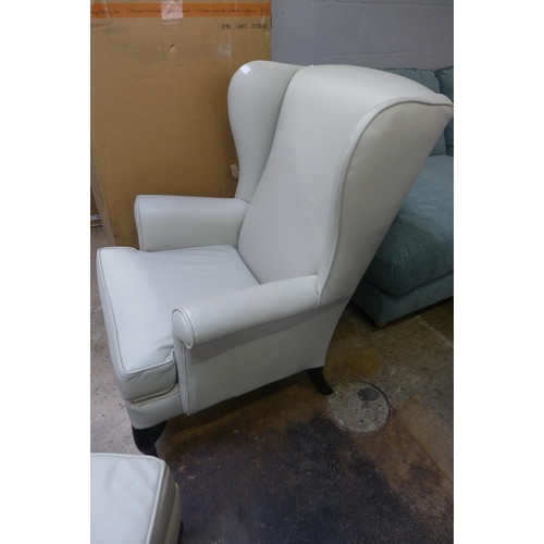 1399 - A John Lewis/Parker Knoll leather wingback chair and footstool, light grey