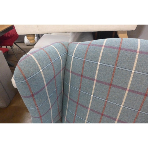 1402 - A Parker Knoll Oberon winged chair in chequered fabric