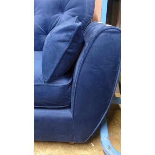 1414 - A blue velvet Hoxton three seater sofa - RRP £799