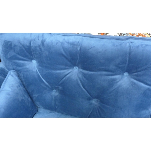 1415 - A blue velvet Hoxton three seater sofa - RRP £799