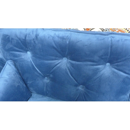1416 - A blue velvet Hoxton three seater sofa - RRP £799