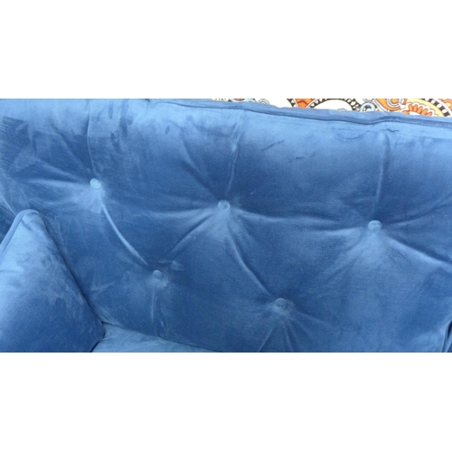 1417 - A blue velvet Hoxton three seater sofa - RRP £799