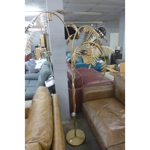 1464 - A gold floor standing palm lamp