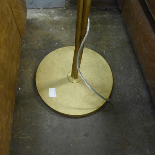 1464 - A gold floor standing palm lamp