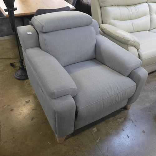 1467 - A Parker Knoll Evolution 1701 power reclining chair with adjustable headrest