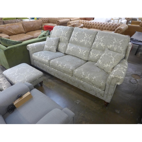 1468 - A Duresta large three seater sofa and footstool in patterned fabric