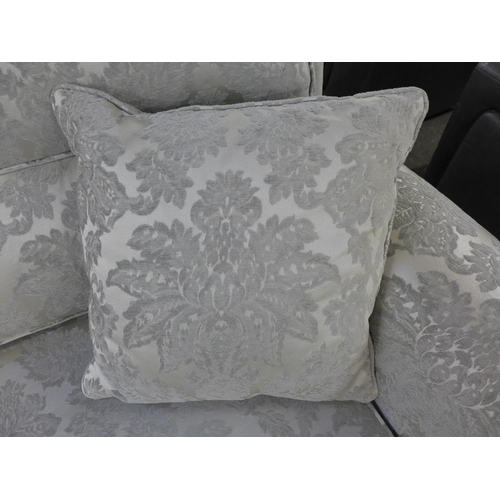 1468 - A Duresta large three seater sofa and footstool in patterned fabric