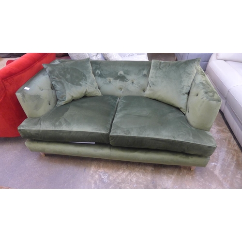 1469 - A John Lewis green velvet button back two seater sofa