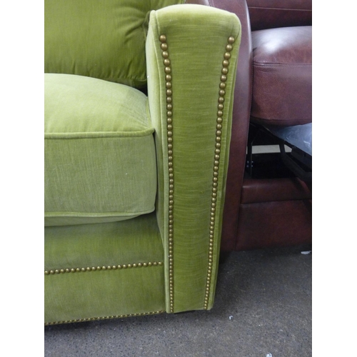 1489 - A willow velvet leather two and a half seater sofa with studwork , RRP £2380 * this lot is subject t... 