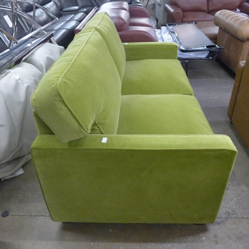 1489 - A willow velvet leather two and a half seater sofa with studwork , RRP £2380 * this lot is subject t... 