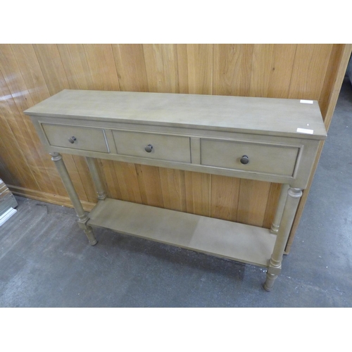 1497 - A three drawer wood effect console table