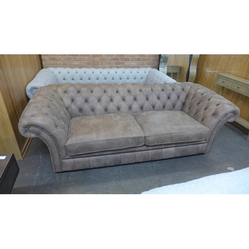 1501 - A Graduate, Rustic brown vintage leather Chesterfield three seater sofa , RRP £3545 * this lot is su... 