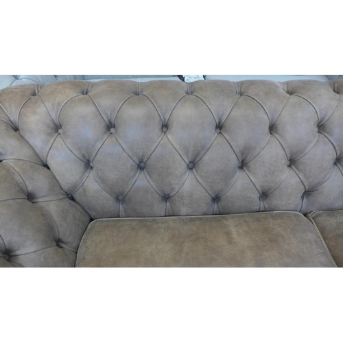 1501 - A Graduate, Rustic brown vintage leather Chesterfield three seater sofa , RRP £3545 * this lot is su... 