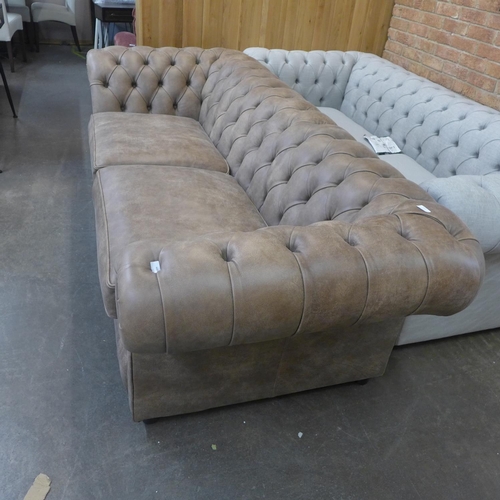 1501 - A Graduate, Rustic brown vintage leather Chesterfield three seater sofa , RRP £3545 * this lot is su... 