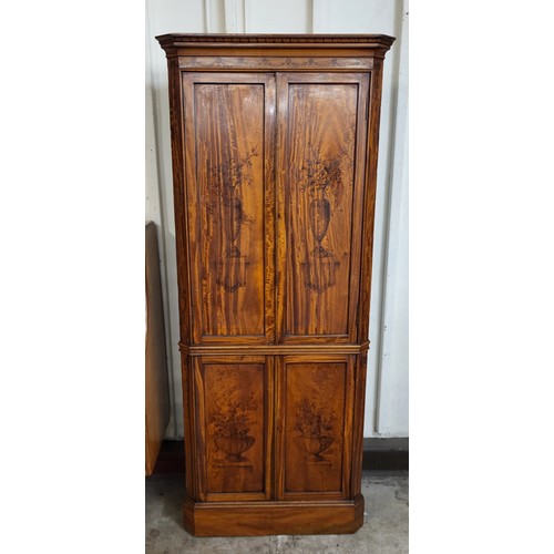 92 - An Edward VII Sheraton Revival painted satinwood splay front freestanding four door corner cabinet