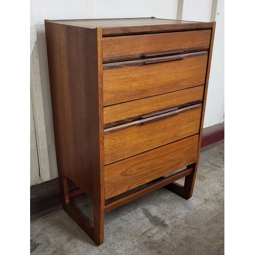 12 - A teak chest of drawers