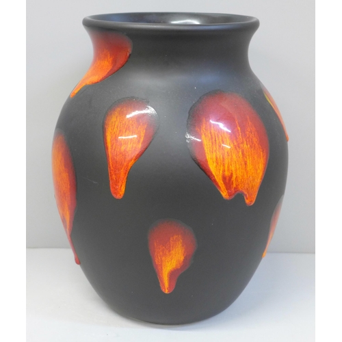 604 - A Poole Pottery vase, 24.5cm