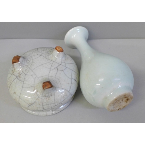 623 - A Chinese Celadon vase, rim a/f, 11.3cm and a Chinese crackle glaze three footed pot