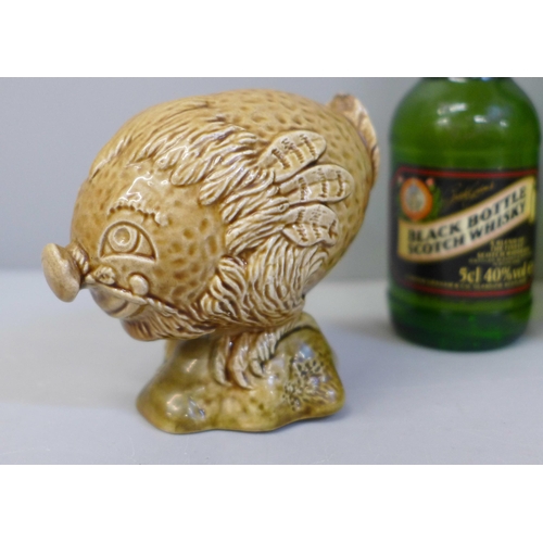 626 - A Beswick Haggis whisky decanter, a Beneagles curling stone whisky decanter and three miniature whis... 
