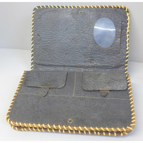 630 - A circa 1940s Egyptian leather folio