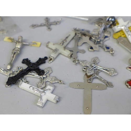 634 - 37 religious metal crosses and 45 metal medallions